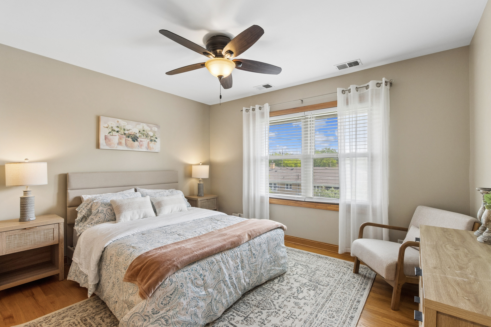 7911 West Rascher Avenue Chicago, IL 60656 - Photo 24 of 39 a bedroom with a large bed and a window