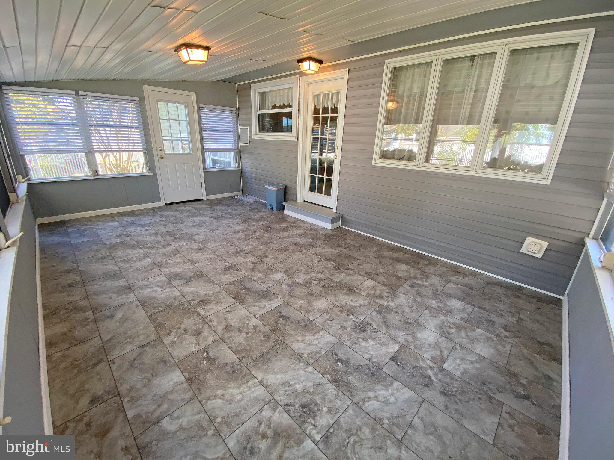 20 Burns Road Claymont, DE 19703 - Photo 3 of 43 Sunroom with amazing view of private outdoor space