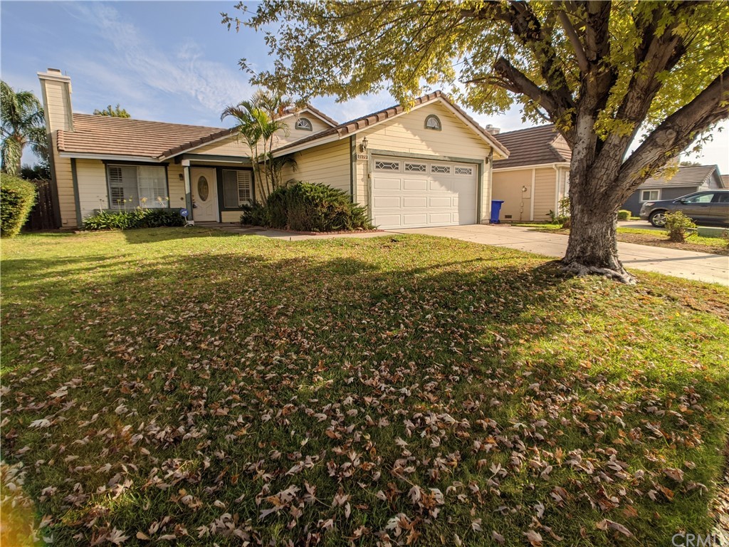 7179 Parkside Place Rancho Cucamonga, CA 91701 - Photo 1 of 1 a front view of a house with a yard
