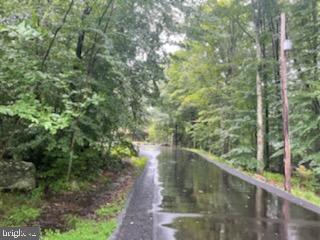 115 Falcon Crest Greentown, PA 18426 - Photo 5 of 7 a view of a forest from balcony