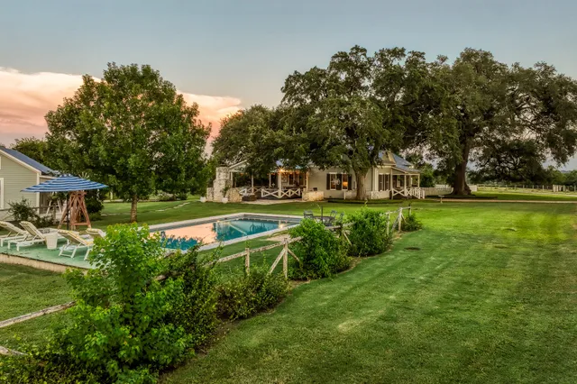 a view of a house with a big yard