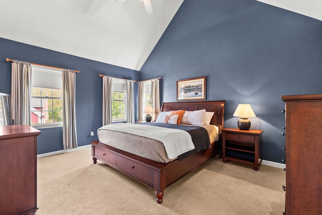 20 Mohawk Road Raynham, MA 02767 - Photo 28 of 42 a spacious bedroom with a bed and a large window