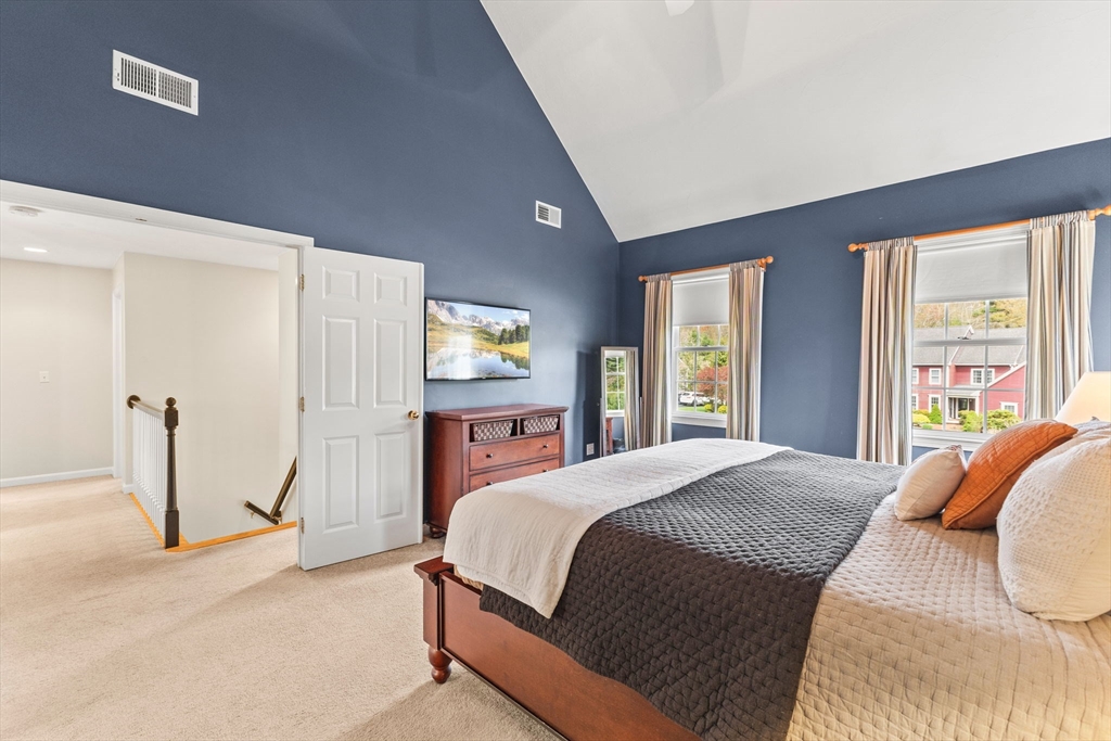 20 Mohawk Road Raynham, MA 02767 - Photo 30 of 42 a bedroom with a bed and a large window