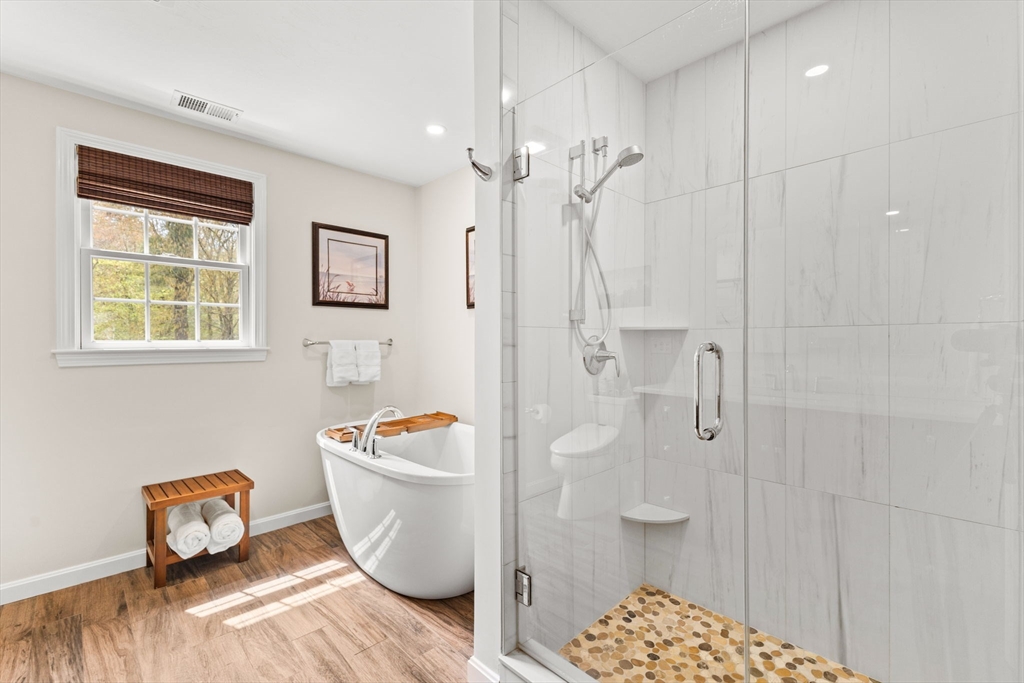 20 Mohawk Road Raynham, MA 02767 - Photo 32 of 42 a bathroom with a sink toilet and shower