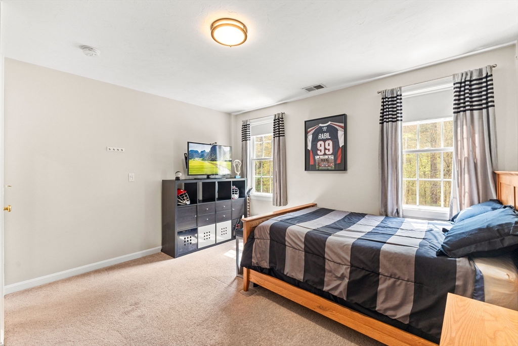 20 Mohawk Road Raynham, MA 02767 - Photo 37 of 42 a bedroom with a bed and window