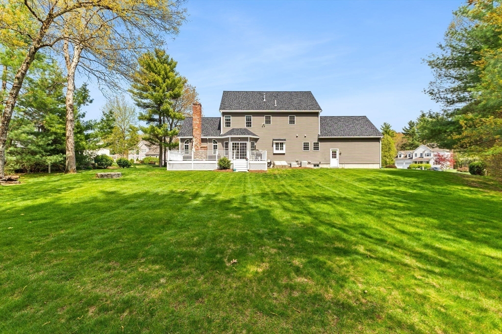 20 Mohawk Road Raynham, MA 02767 - Photo 4 of 42 a house view with a sitting space and garden