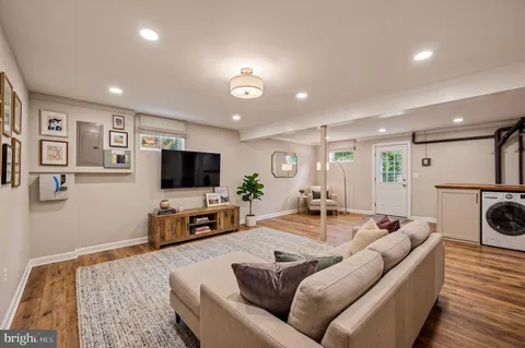 a bedroom with a bed and a couch