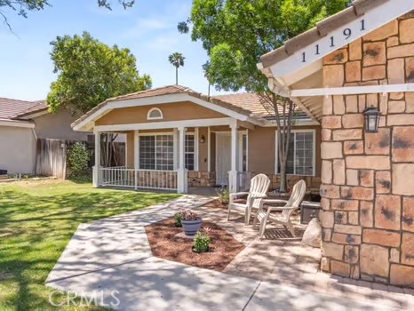 11191 Baker Lane Riverside, CA 92505 - Photo 1 of 49 a front view of a house with a yard