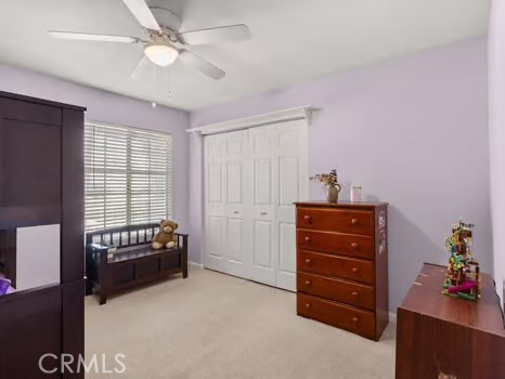 11191 Baker Lane Riverside, CA 92505 - Photo 20 of 49 a bedroom with a bed and a dresser