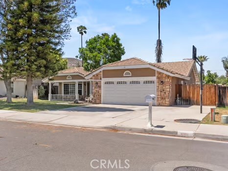 11191 Baker Lane Riverside, CA 92505 - Photo 2 of 49 a front view of a house with a yard