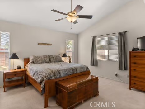 11191 Baker Lane Riverside, CA 92505 - Photo 22 of 49 a spacious bedroom with a bed and window