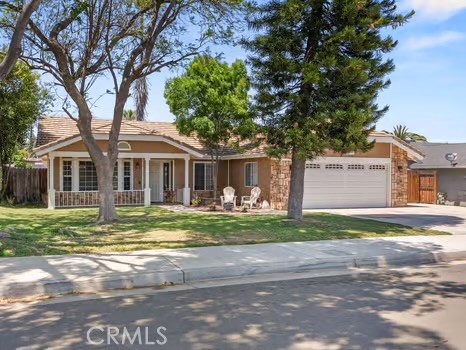 11191 Baker Lane Riverside, CA 92505 - Photo 3 of 49 a front view of a house with a yard