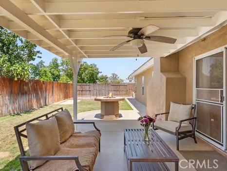 11191 Baker Lane Riverside, CA 92505 - Photo 32 of 49 a view of a couches and dinning table in patio