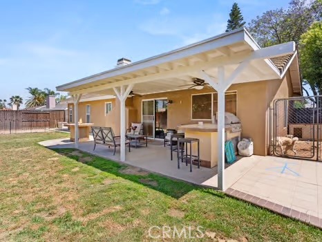 11191 Baker Lane Riverside, CA 92505 - Photo 33 of 49 a view of a house with dining room and chairs