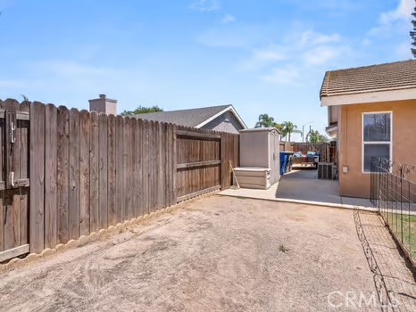 11191 Baker Lane Riverside, CA 92505 - Photo 39 of 49 a view of a house with wooden fence