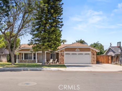 11191 Baker Lane Riverside, CA 92505 - Photo 4 of 49 front view of a house with a garden