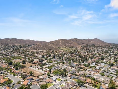 11191 Baker Lane Riverside, CA 92505 - Photo 43 of 49 an aerial view of residential house and mountains in the background