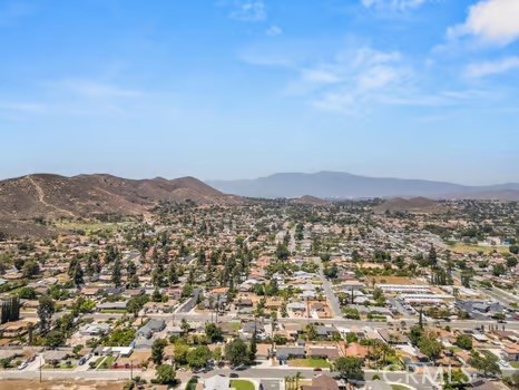 11191 Baker Lane Riverside, CA 92505 - Photo 49 of 49 an aerial view of residential house and mountains in the background