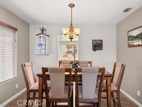 11191 Baker Lane Riverside, CA 92505 - Photo 10 of 49 a view of a dining room with furniture window and outside view