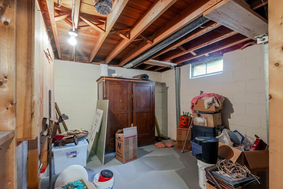 302 Radliff Road Bloomington, IL 61701 - Photo 28 of 35 a storage room with lots of stuff and furniture