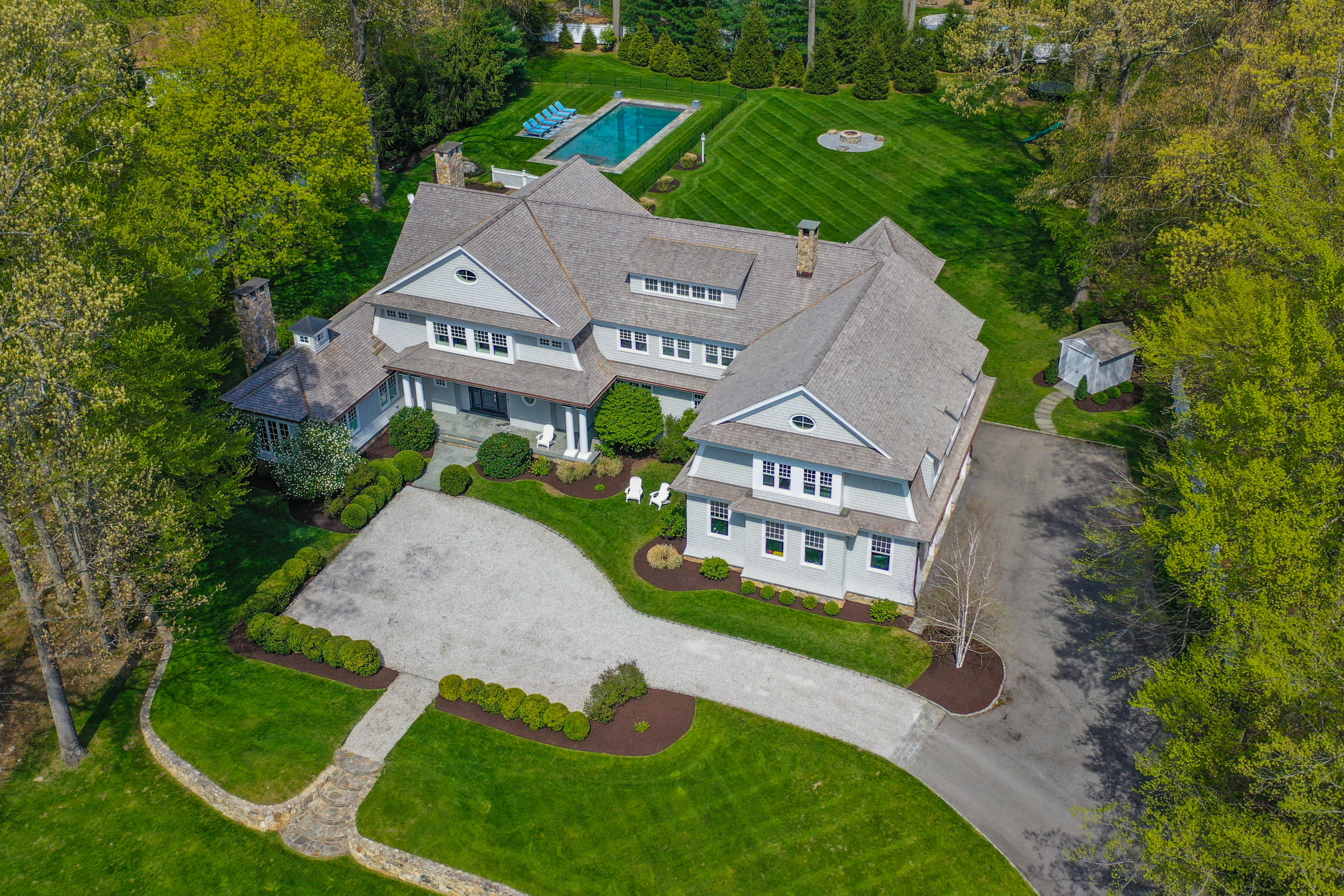 an aerial view of a house with a garden