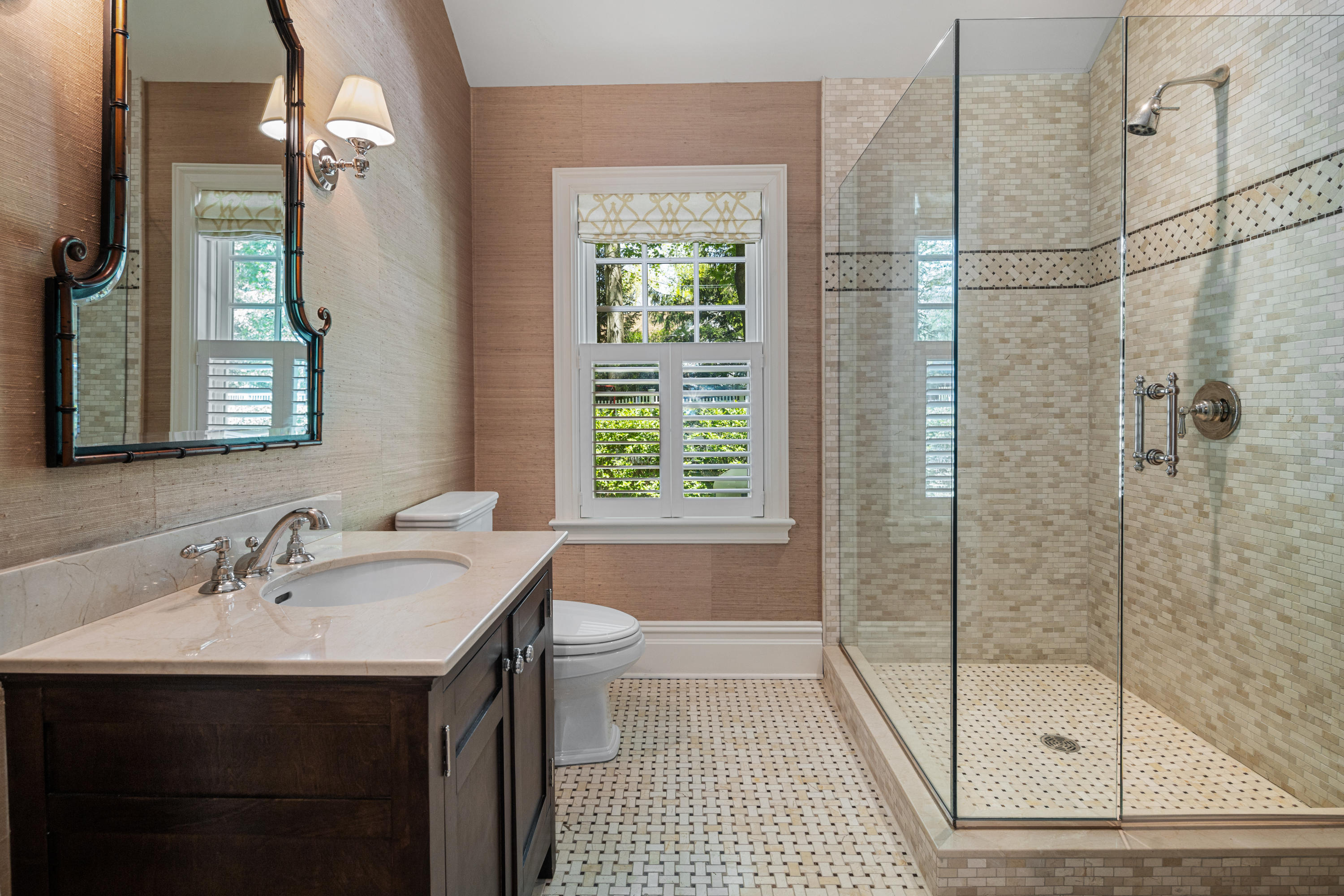 12 Shady Acres Road Darien, CT 06820 - Photo 23 of 47 a bathroom with a sink a toilet and shower