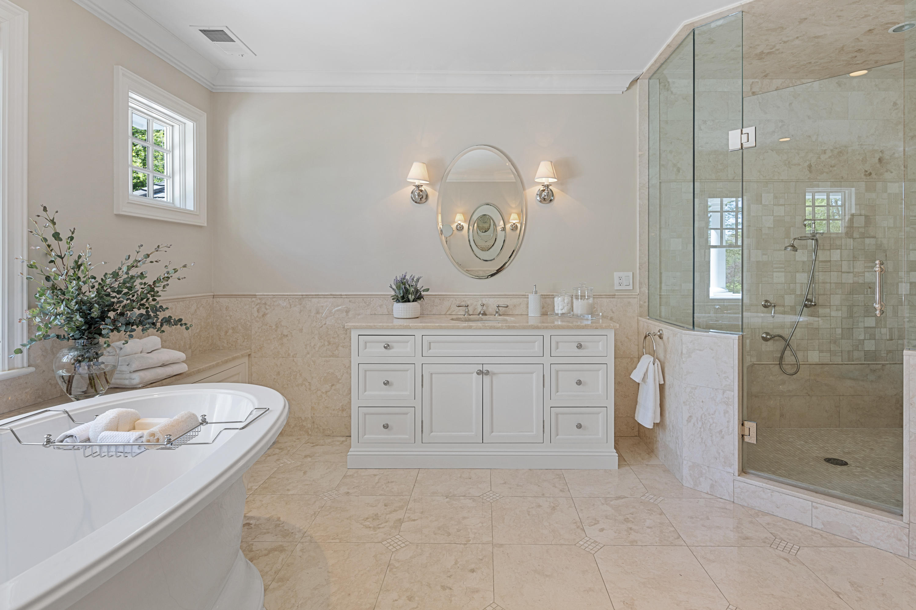 12 Shady Acres Road Darien, CT 06820 - Photo 28 of 47 a spacious bathroom with a granite countertop sink a mirror and shower