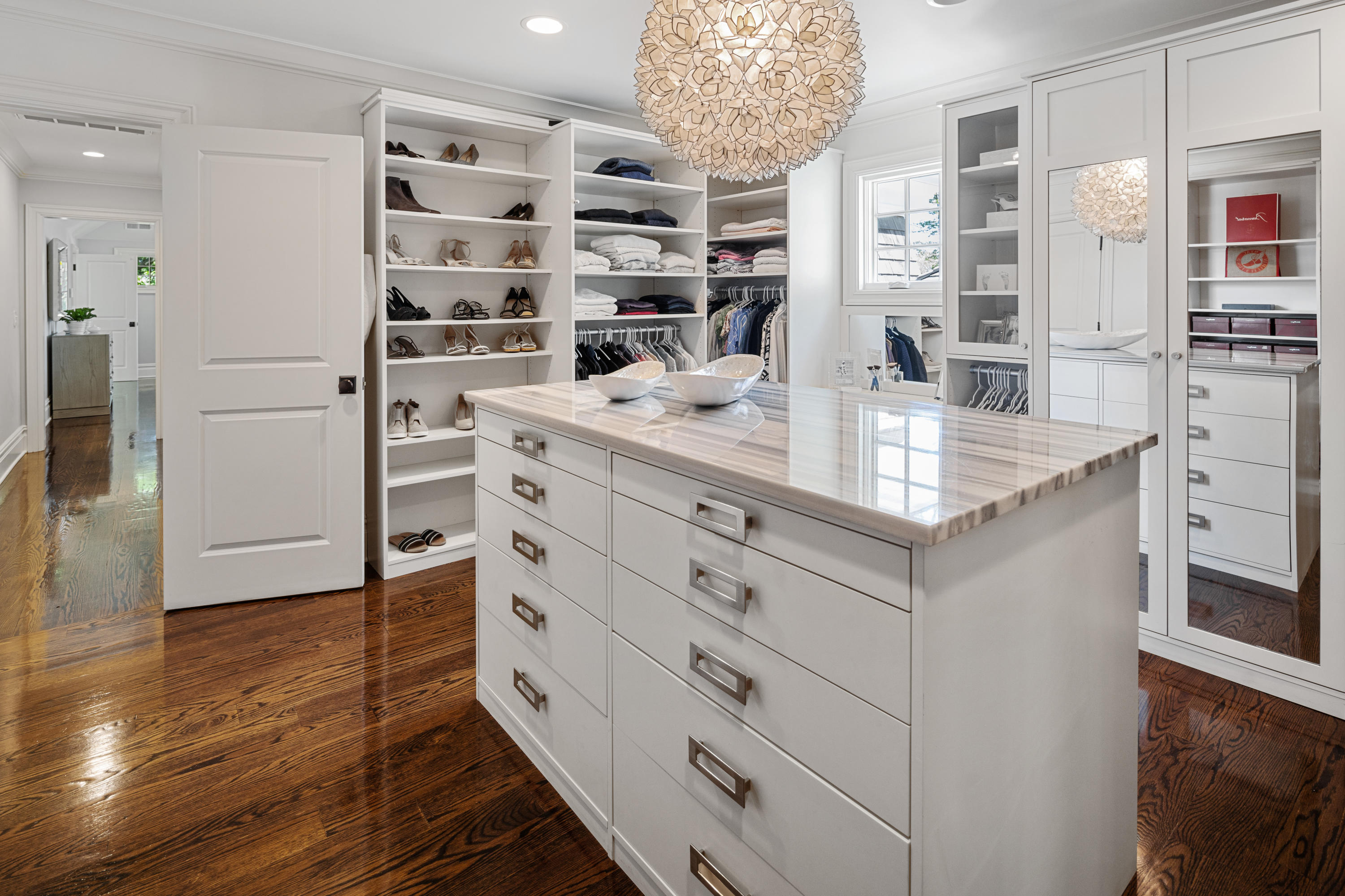12 Shady Acres Road Darien, CT 06820 - Photo 29 of 47 a kitchen with cabinets and wooden floor