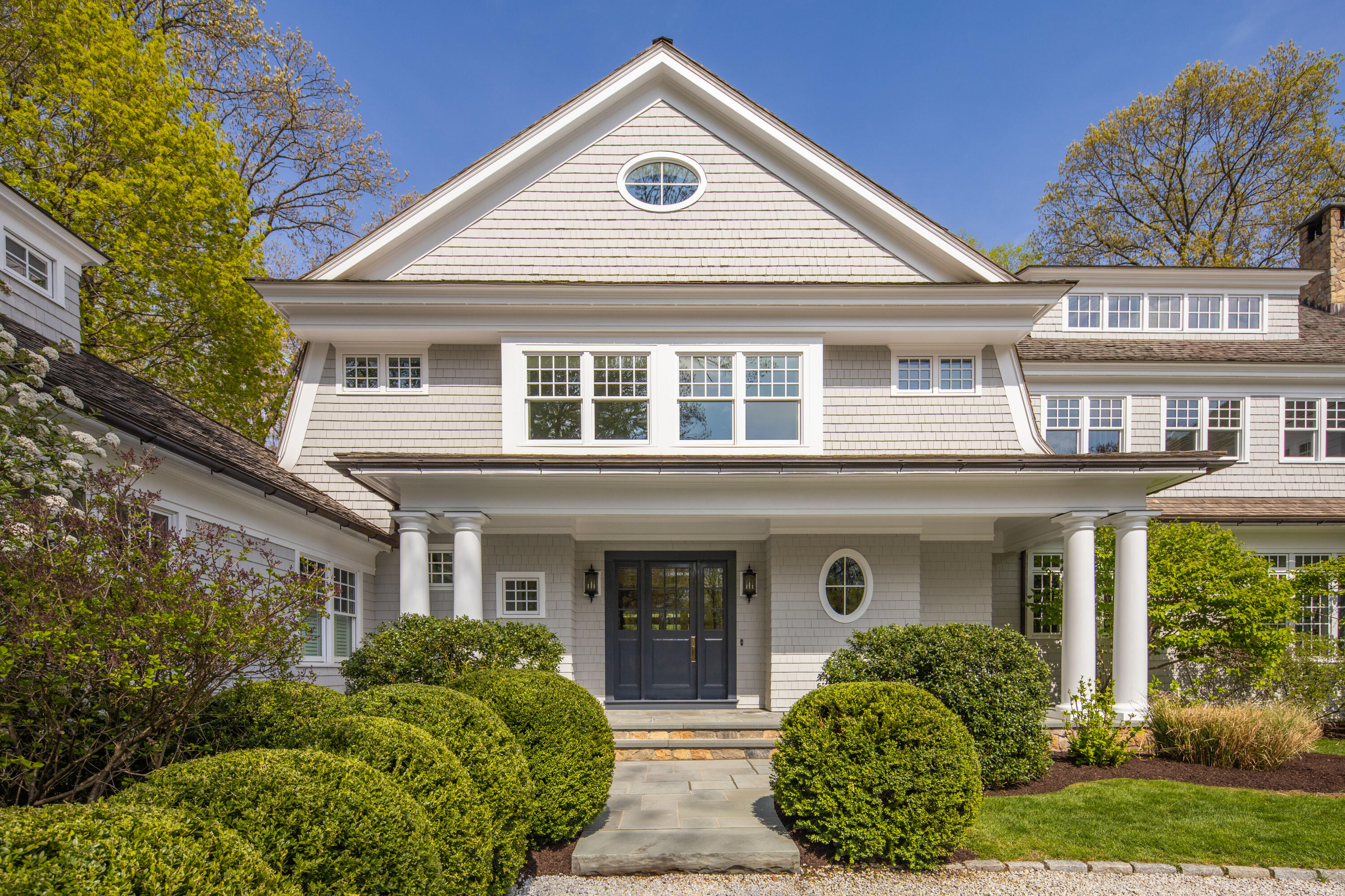 12 Shady Acres Road Darien, CT 06820 - Photo 4 of 47 front view of a house with a porch