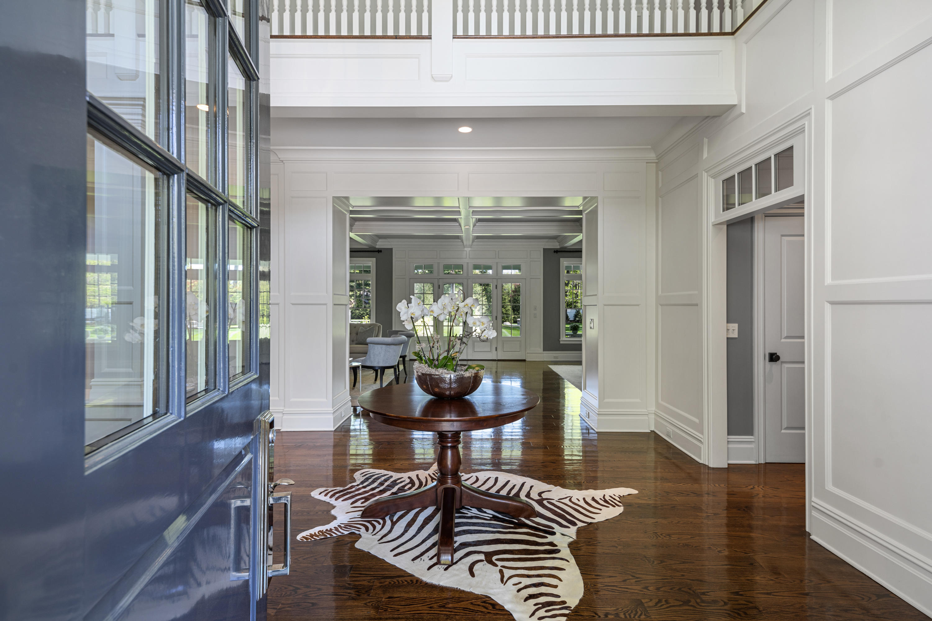 12 Shady Acres Road Darien, CT 06820 - Photo 5 of 47 a living room with furniture and a chandelier