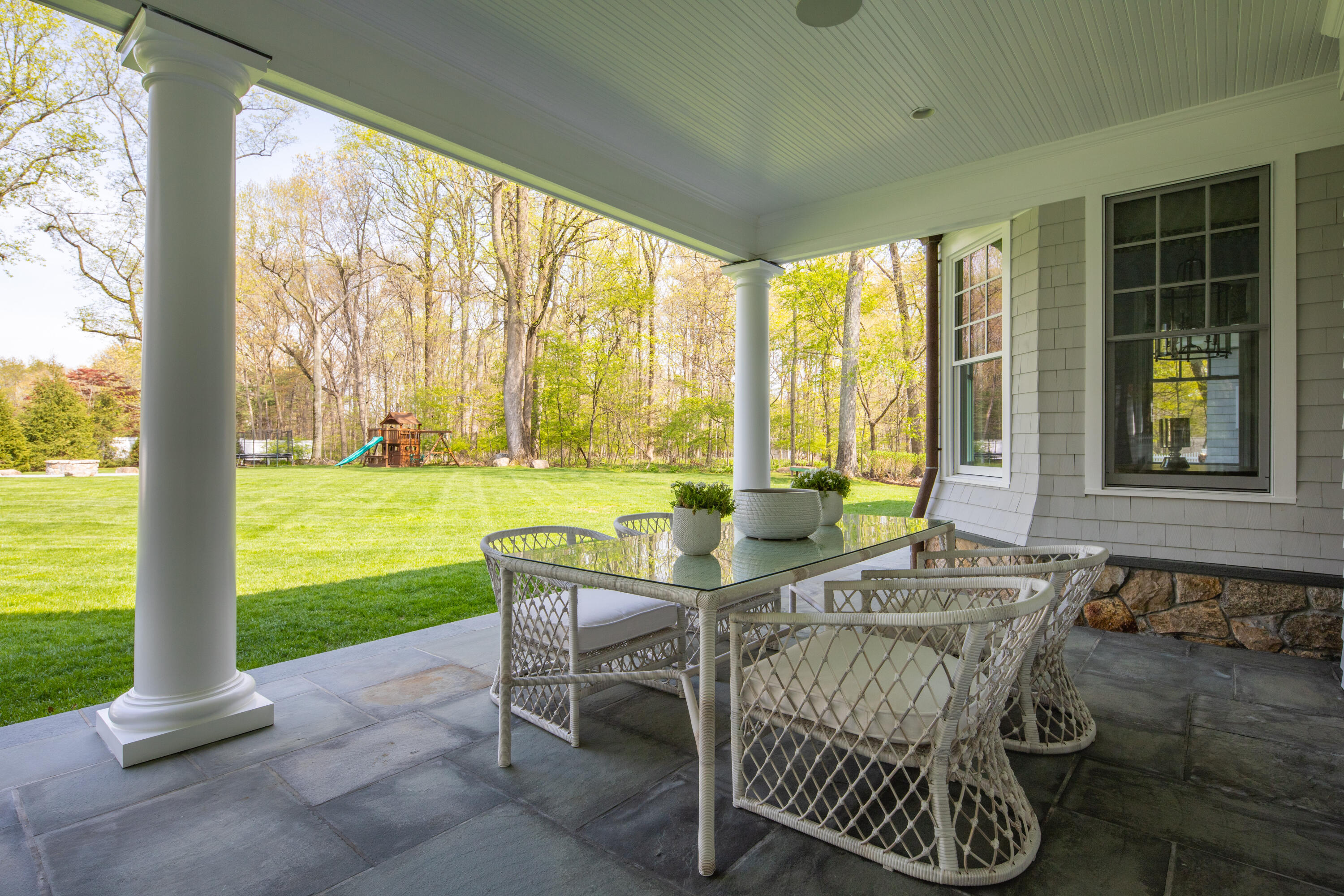 12 Shady Acres Road Darien, CT 06820 - Photo 41 of 47 a living room with patio area and garden view