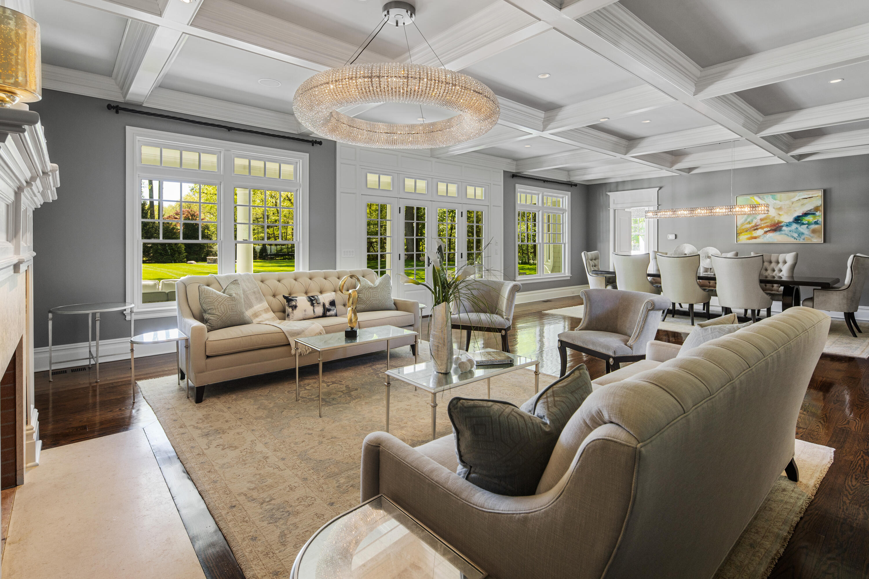 12 Shady Acres Road Darien, CT 06820 - Photo 9 of 47 a living room with furniture ceiling fan and a large window