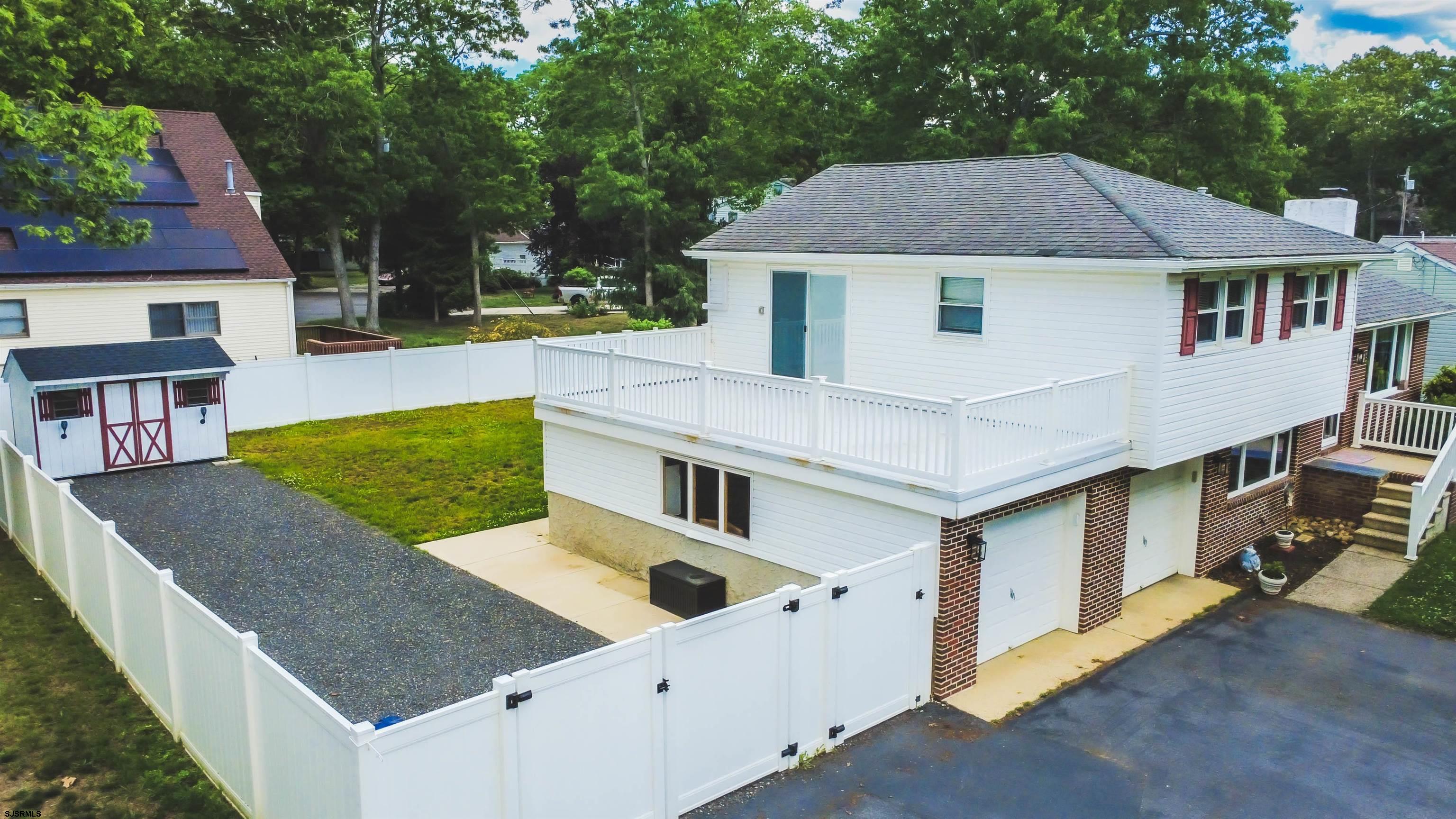 518 Delaware Avenue Absecon, NJ 08201 - Photo 3 of 38 a aerial view of a house with a yard