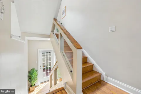 a view of entryway with wooden floor