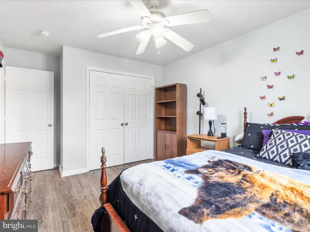 a bathroom with a sink vanity and a mirror