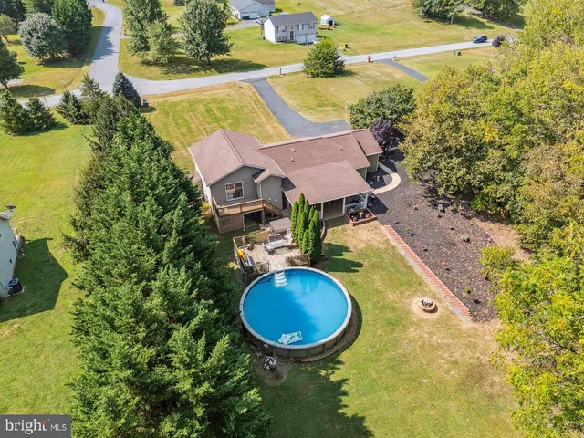 an aerial view of a swimming pool