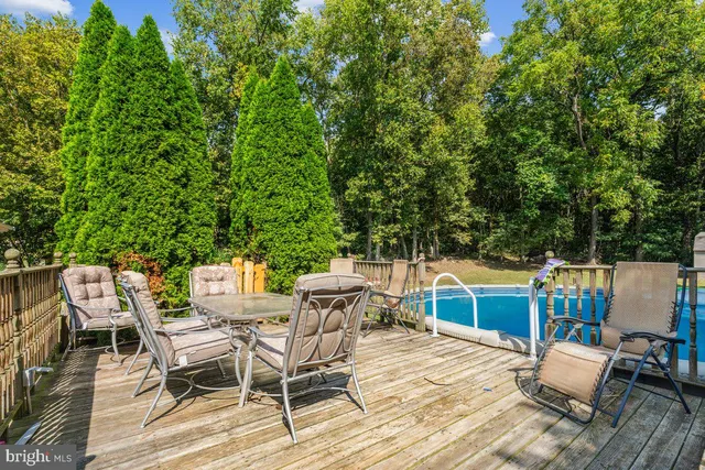 a balcony with wooden floor