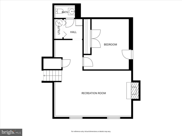 a picture of a bench in front of a wall