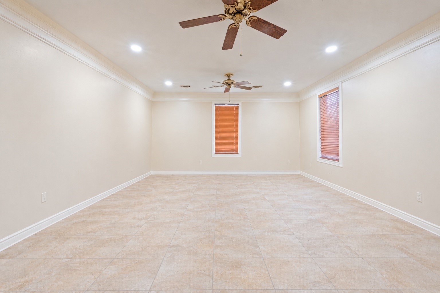 7639 Post Bridge Road Spring, TX 77389 - Photo 20 of 42 an empty room with windows and fan