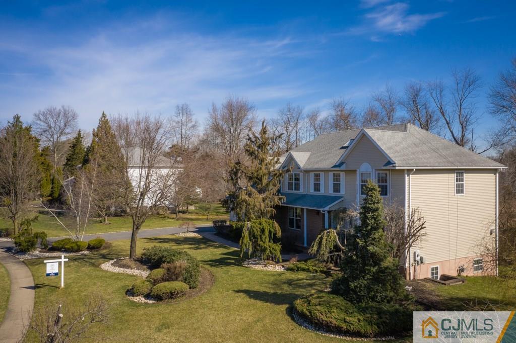 15 Gramercy Road Monmouth Junction, NJ 08852 - Photo 2 of 17 a view of a house with a yard and sitting area