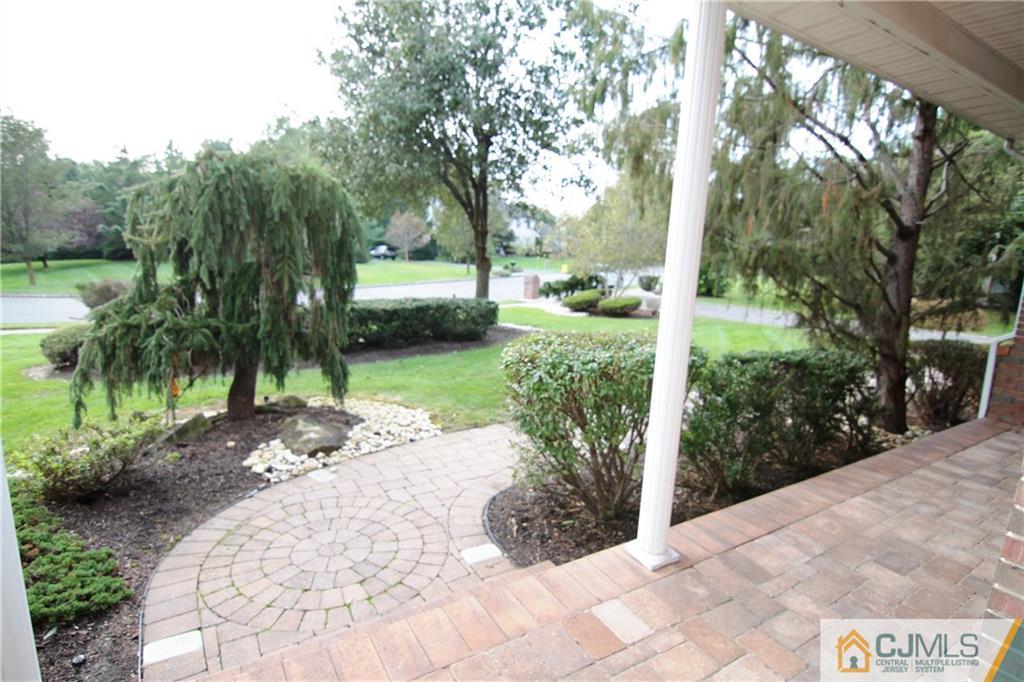 15 Gramercy Road Monmouth Junction, NJ 08852 - Photo 15 of 17 a view of a garden with pathway