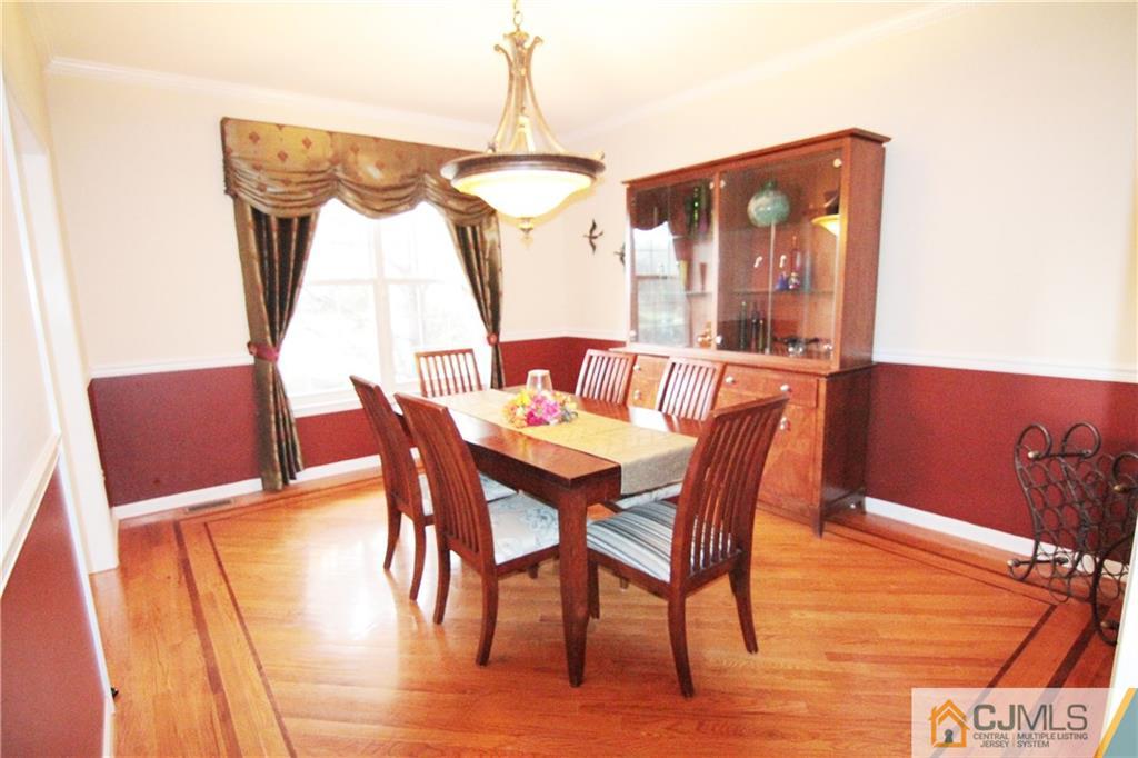 15 Gramercy Road Monmouth Junction, NJ 08852 - Photo 6 of 17 a dining room with furniture window and wooden floor