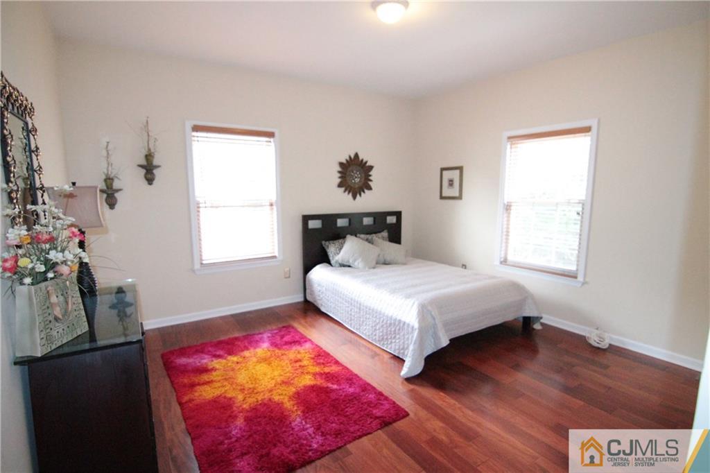 15 Gramercy Road Monmouth Junction, NJ 08852 - Photo 10 of 17 a bedroom with a bed and a window