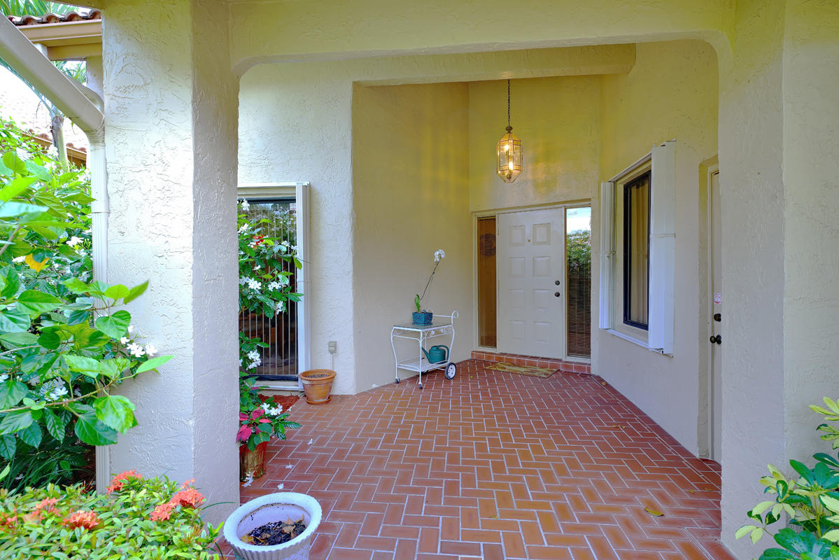 23365 Water Circle Boca Raton, FL 33486 - Photo 2 of 44 Front Brick Tile Entrance