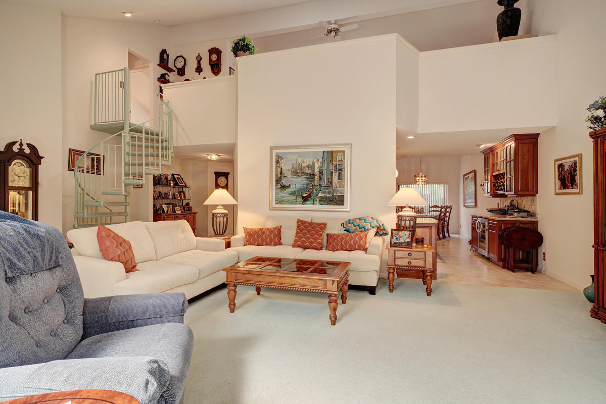 23365 Water Circle Boca Raton, FL 33486 - Photo 31 of 44 Living Rm with Spiral Staircase to Loft