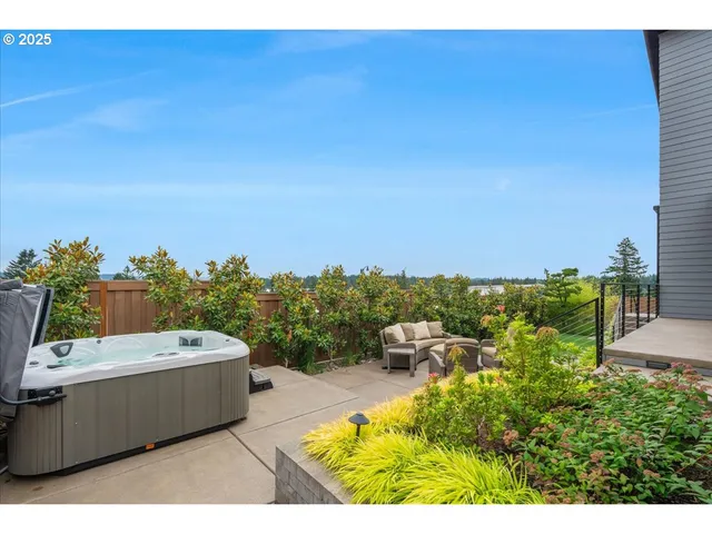 a view of a swimming pool with a lounge chair