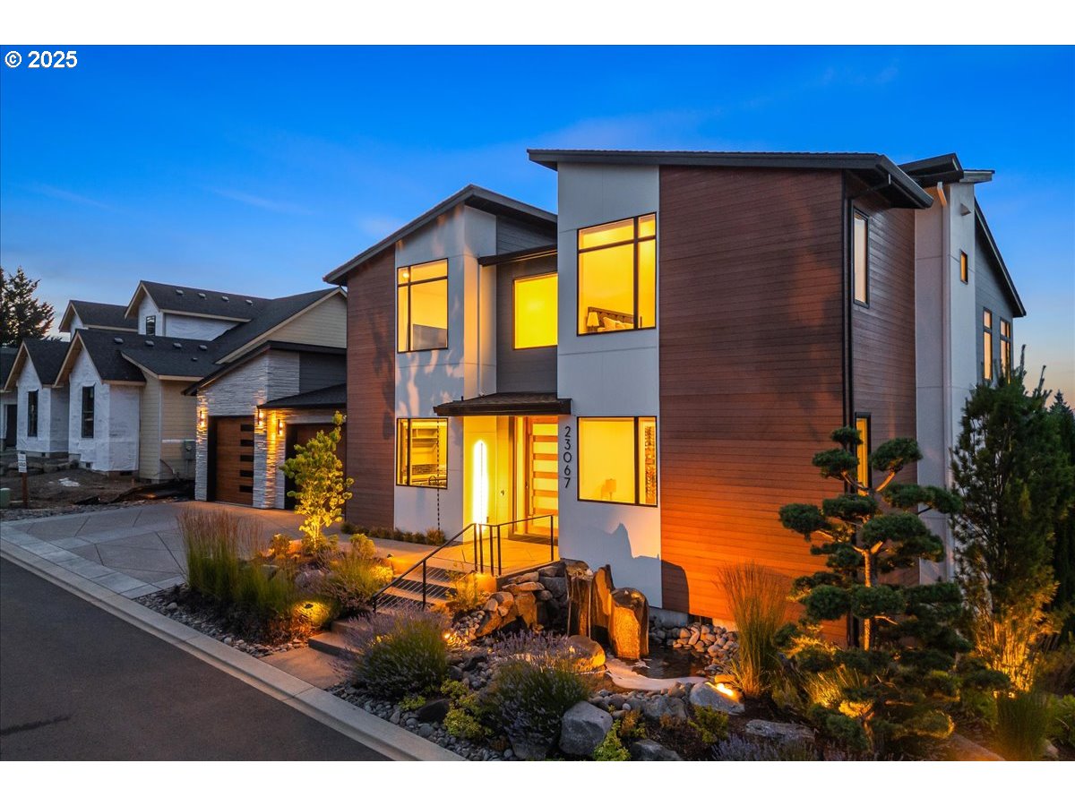 23067 Southwest Curry Ridge Drive Sherwood, OR 97140 - Photo 42 of 48 a view of a house with a swimming pool