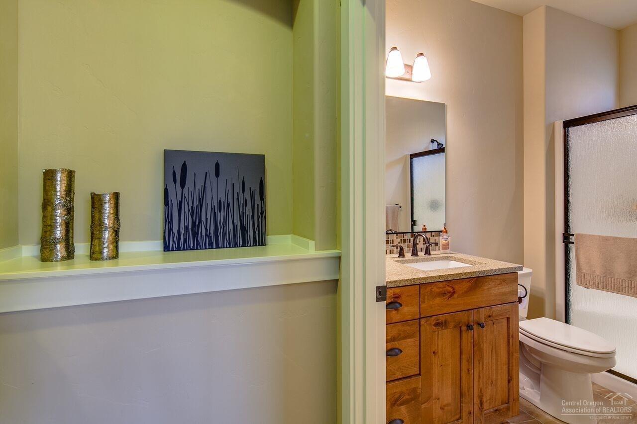 61061 Manhae Loop Bend, OR 97702 - Photo 13 of 25 This full second bath serves is directly