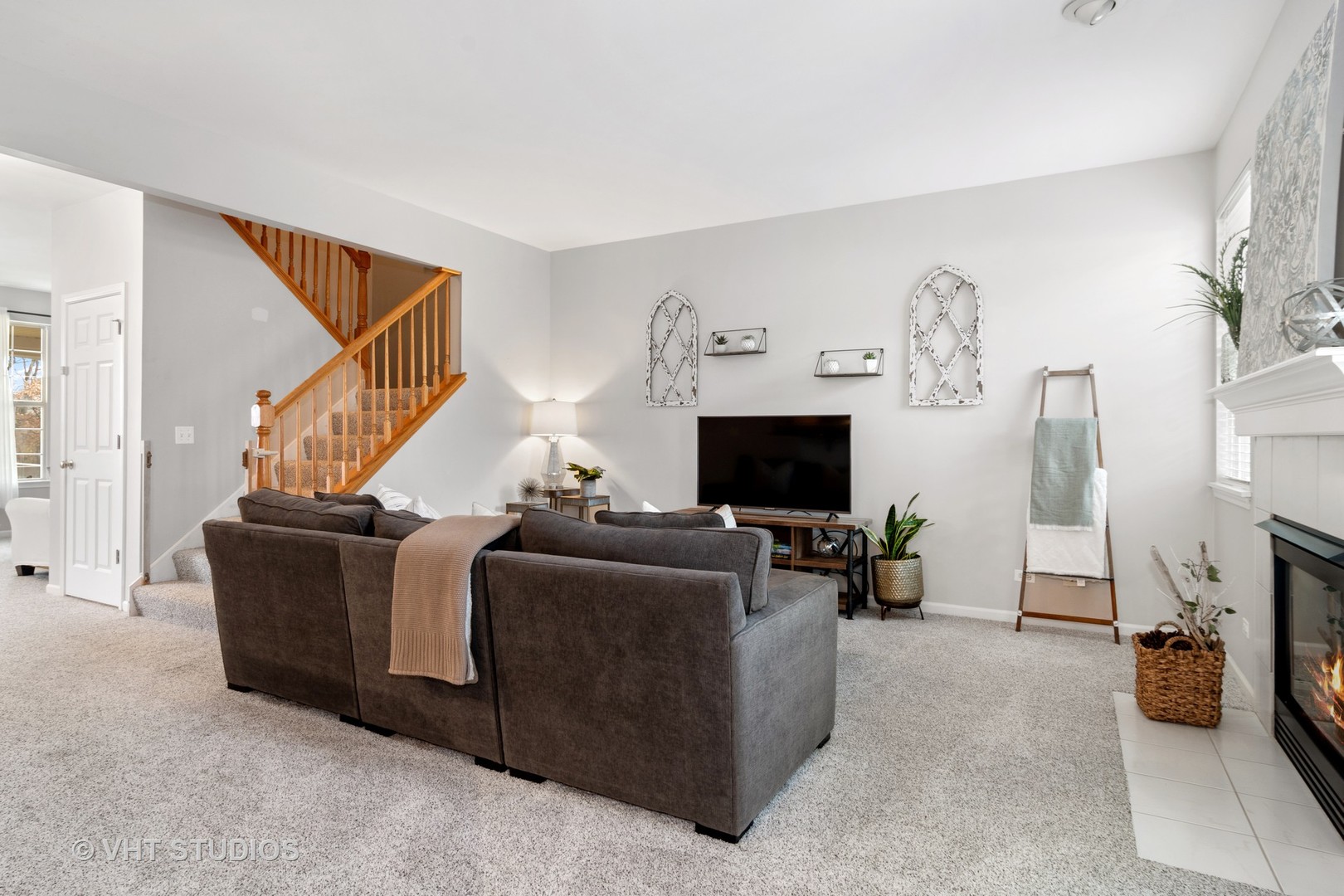 1931 Wagner Road Batavia, IL 60510 - Photo 14 of 27 a living room with furniture and a flat screen tv