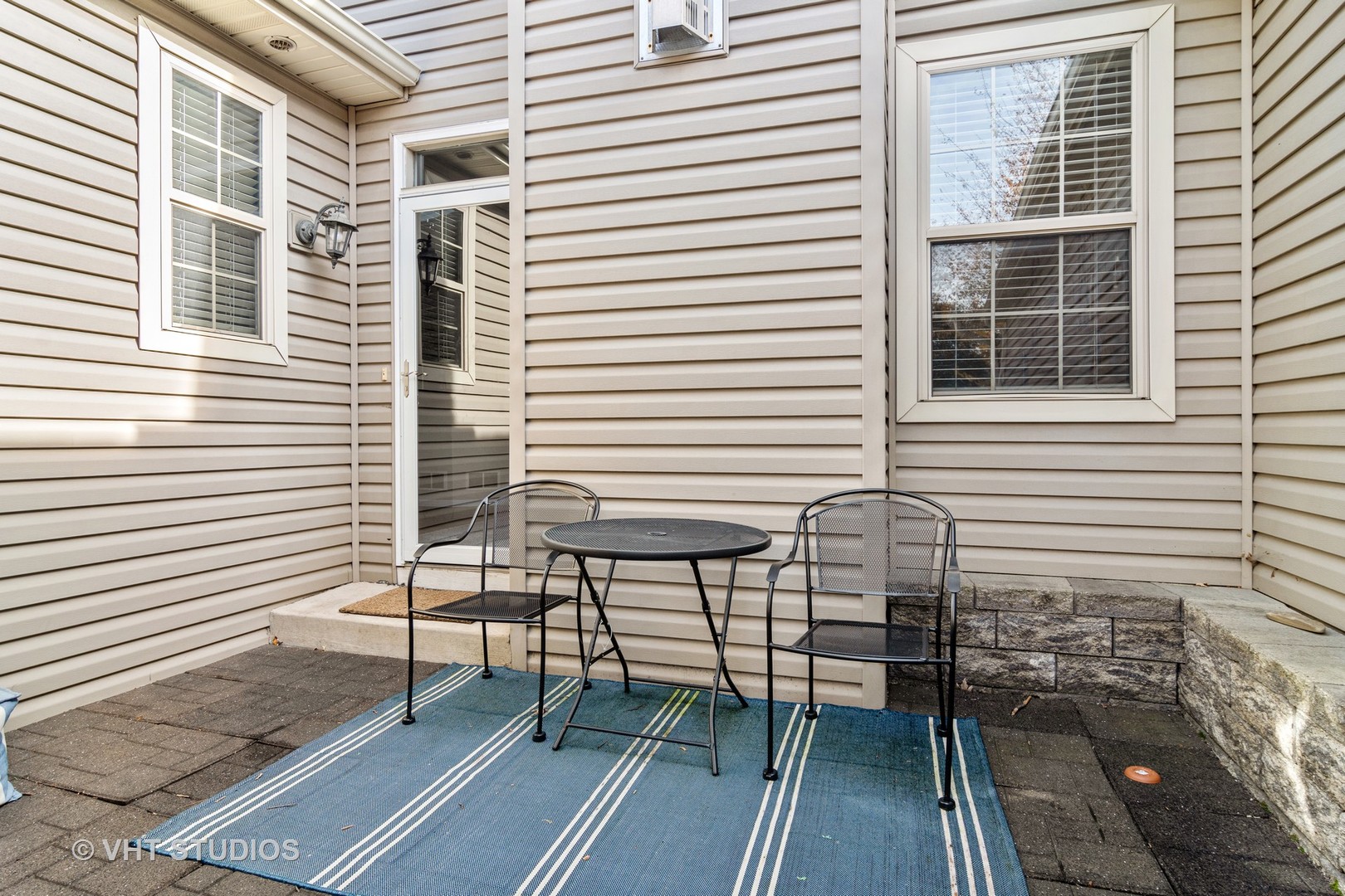 1931 Wagner Road Batavia, IL 60510 - Photo 25 of 27 a balcony with table and chairs